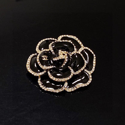 18K  Chanel Black Flower Brooch